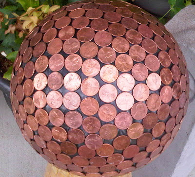 How to make a penny bowling ball, fun and unique yard art for your garden. And some people say the copper pennies repel slugs!