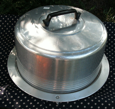 Vintage metal cake carrier.