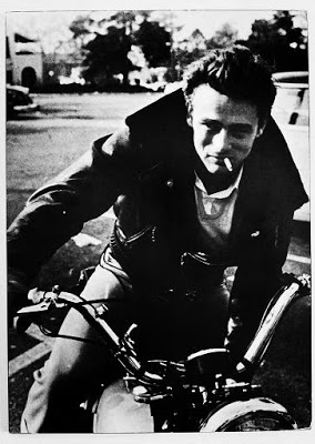 James Dean riding vintage motorcycle