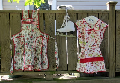 Vintage aprons and ice skates found at the thrift store.
