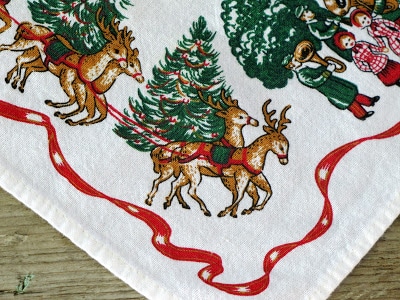 Reindeer on a vintage tablecloth.