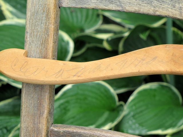 Handwritten name on a clothes hanger.