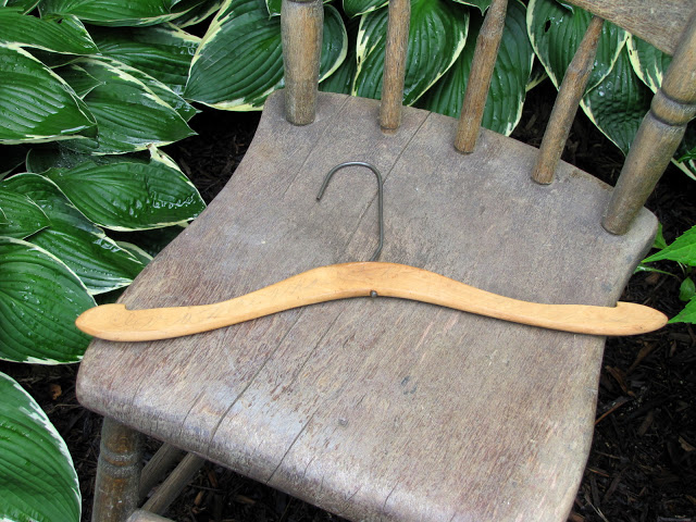 Wooden clothes hanger.