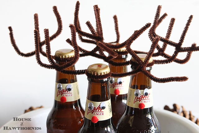 How to make your beer (or pop for that matter) bottles into cute little reindeer for the holiday season. They make a great DIY Christmas hostess gift too. via houseofhawthornes.com How to make your beer (or pop for that matter) bottles into cute little reindeer for the holiday season. They make a great DIY Christmas hostess gift too. via houseofhawthornes.com