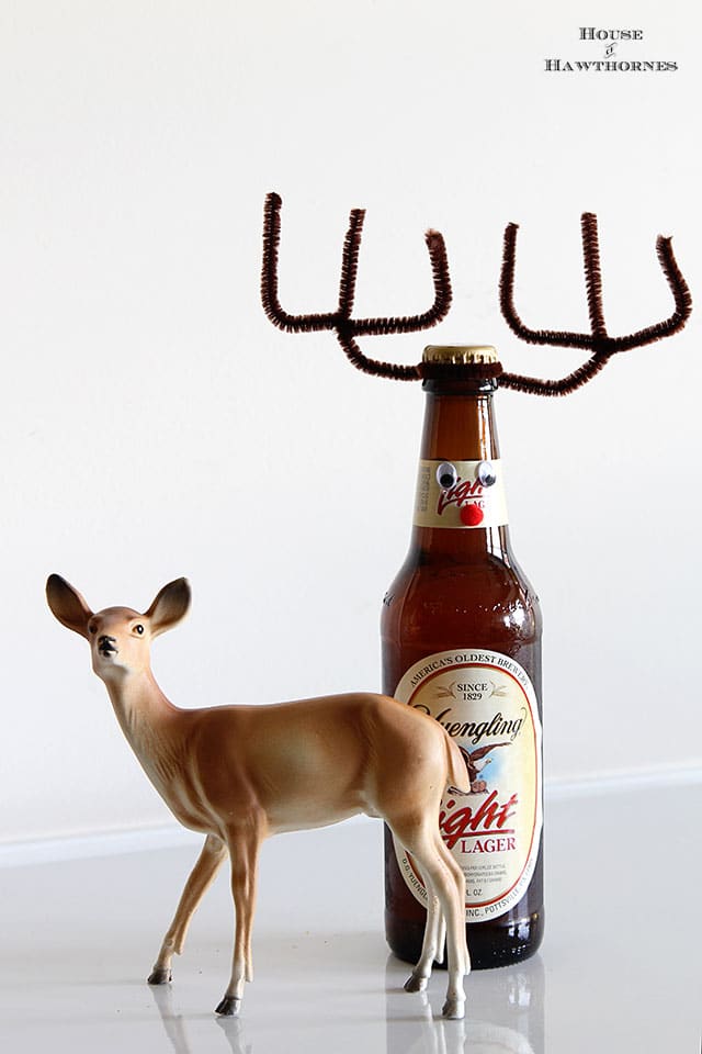 How to make your beer (or pop for that matter) bottles into cute little reindeer for the holiday season. They make a great DIY Christmas hostess gift too. via houseofhawthornes.com How to make your beer (or pop for that matter) bottles into cute little reindeer for the holiday season. They make a great DIY Christmas hostess gift too. via houseofhawthornes.com