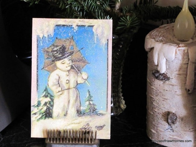 Vintage snowman image smoking a pipe.