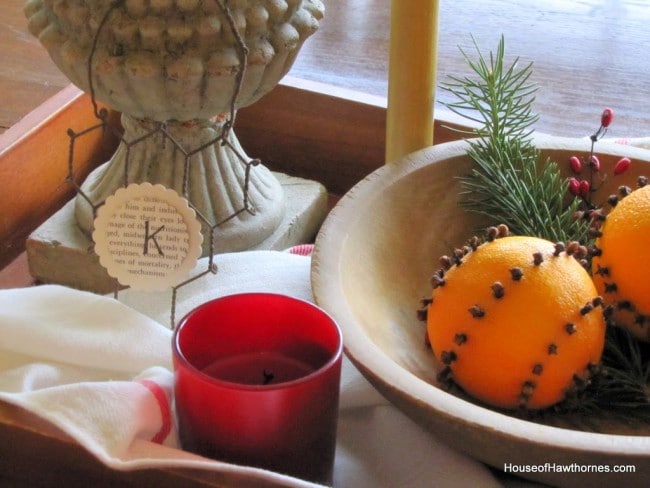 Orange pomander balls used as Christmas decor.