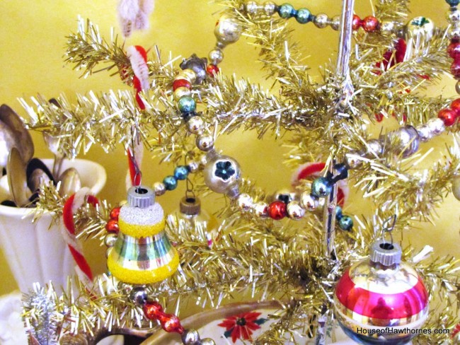 Vintage Shiny Brite Christmas ornaments on a tinsel tree.