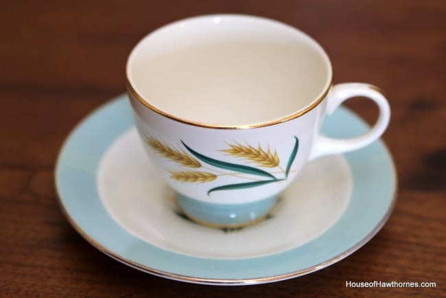 Coffee mug and saucer from a vintage set of Viking golden wheat patterned dinnerware.