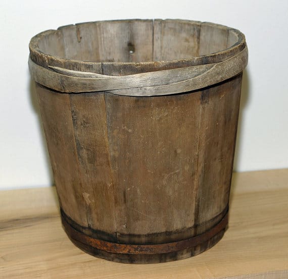 Wooden maple syrup bucket.