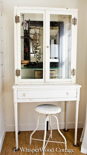 Vintage medical cabinet used as a jewelry organizer.