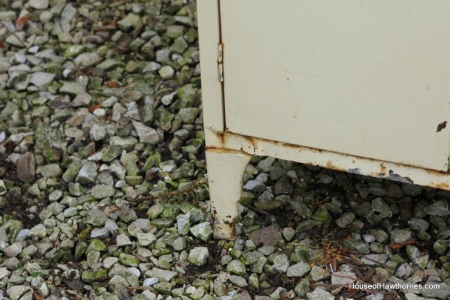 Legs of metal cabinet.