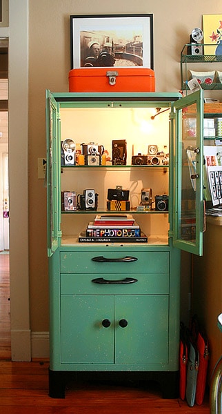 Beautiful green medical cabinet used in home decor. 