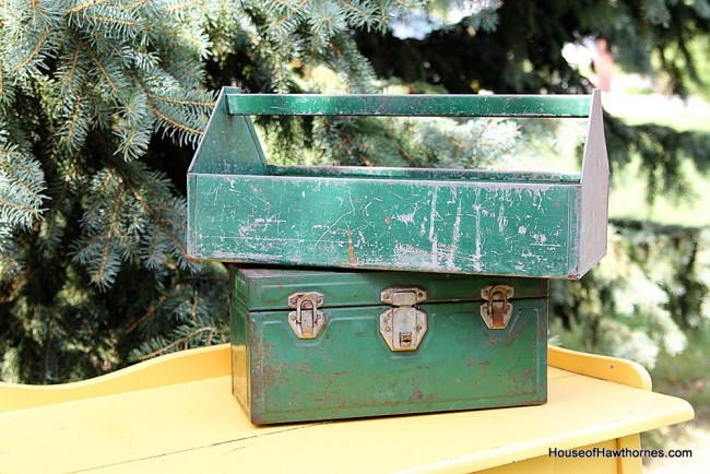 Old green tool caddy and toolbox.