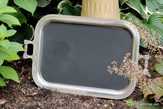 Silver serving platter made into a chalkboard.