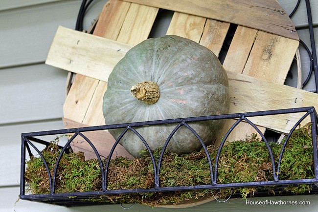DIY tutorial to make a fall planter box with natural elements found at craft stores. A great alternative to a traditional fall wreath for your front door!