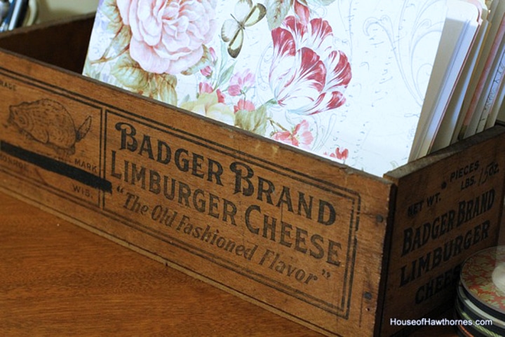 Badger brand wooden cheesebox used as a file holder.