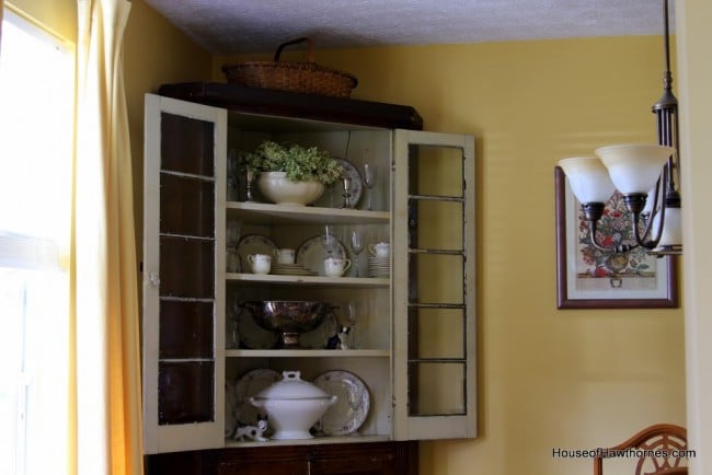 Corner cupboard with soup tureens,
