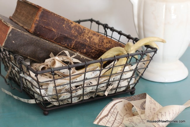 Basket full of old books.