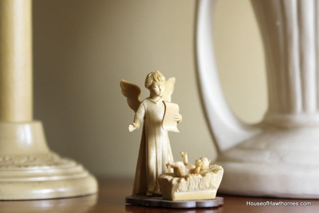 Small nativity set used in a vintage Christmas display along with a Royal typewriter