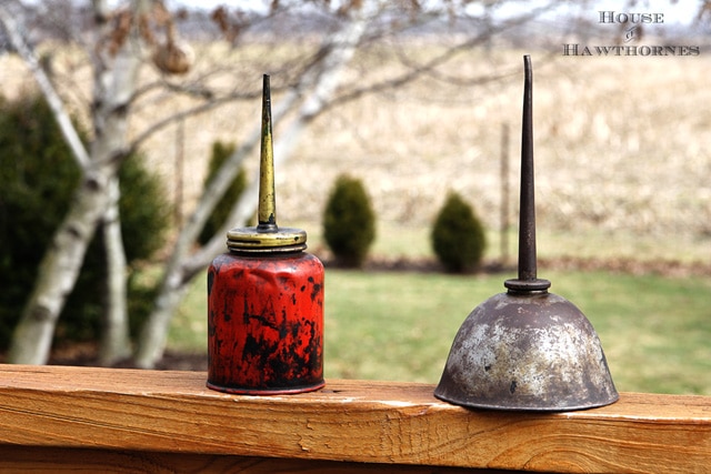 Old oil cans used for home decor.
