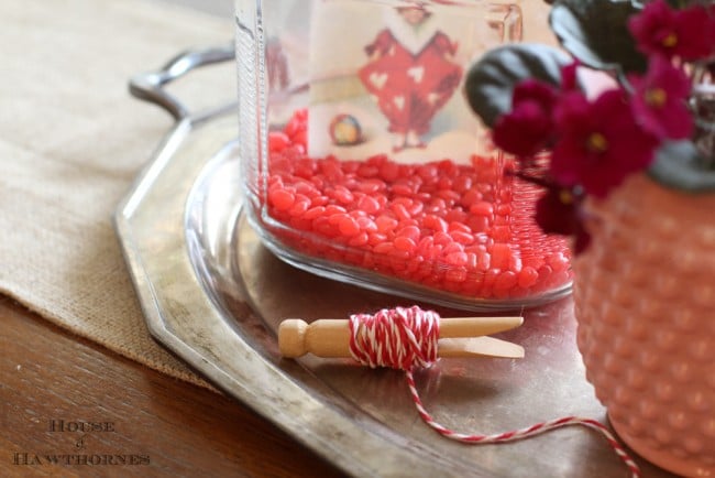 Cinnamon hearts in a jar for a super cute and easy five minute Valentine's Day craft for your home. 