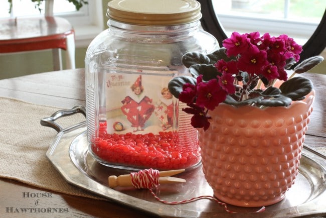 Cinnamon hearts in a jar for a super cute and easy five minute Valentine's Day craft for your home. 