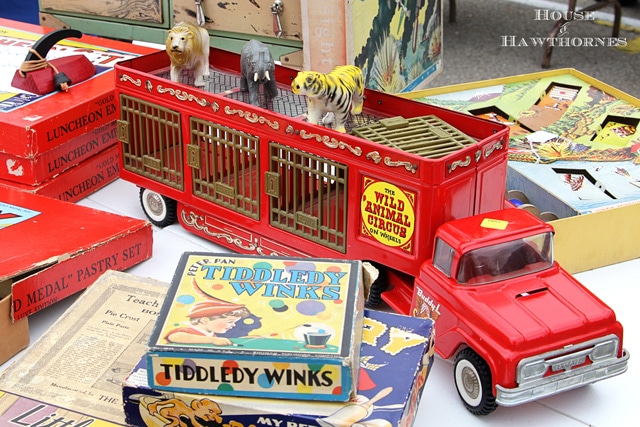 A vintage red Buddy L Wild Animal Circus truck.