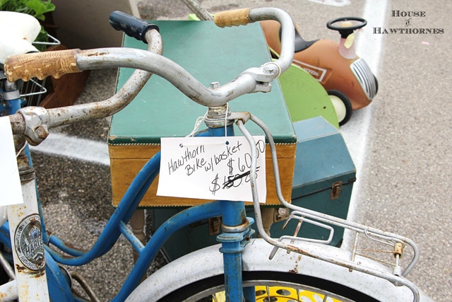 Vintage rusty blue Hawthorne bicycle.