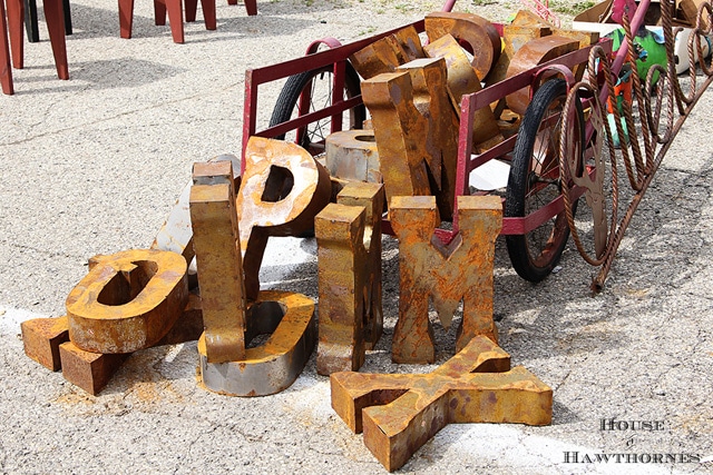 Large industrial metal letters.