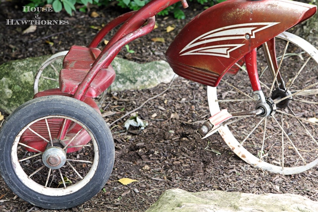 1950's red tricycle.