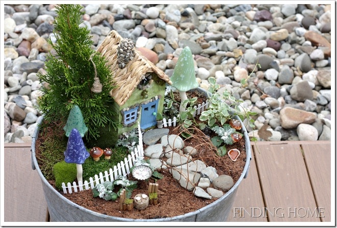 Fairy garden made out of a galvanized tub from findinghome.com