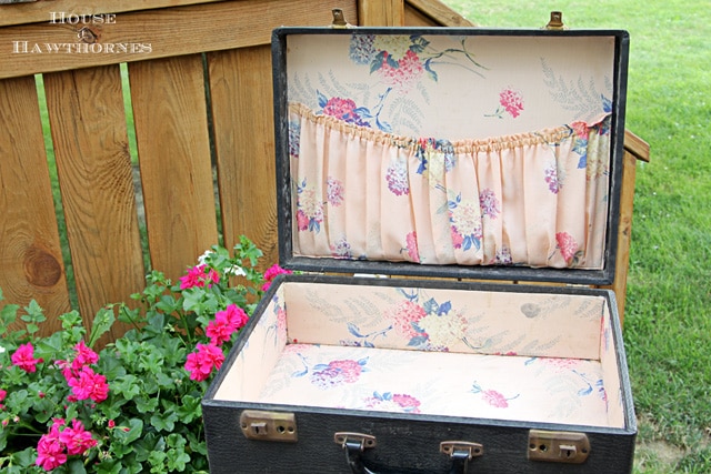 Vintage suitcase with floral lining.