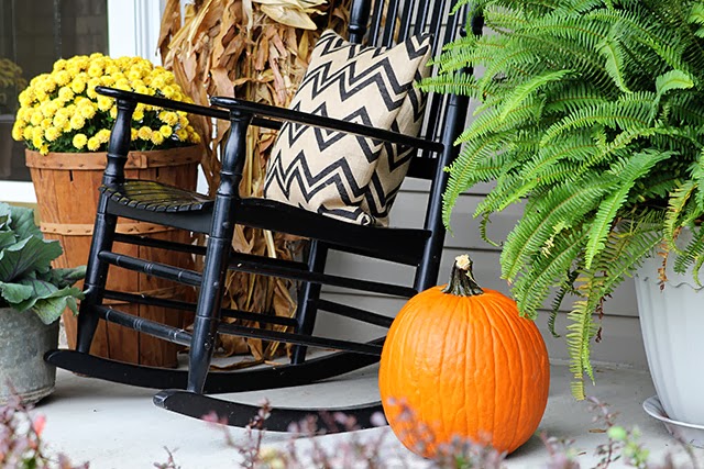 Fall porch decor with cornstalks, DIY wreath, and chevron pillows @ houseofhawthornes.com