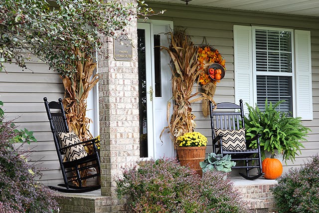 Fall porch decor with cornstalks, DIY wreath, and chevron pillows @ houseofhawthornes.com