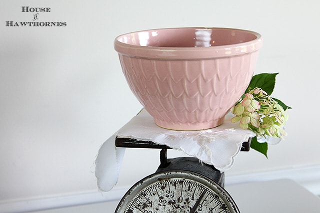 Vintage pink McCoy mixing bowl with fish scale petal feather pattern