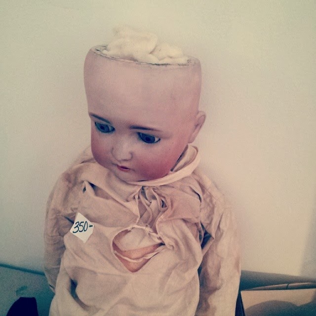 Scary doll missing part of her head 