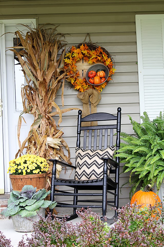 Fall porch decor with cornstalks, DIY wreath, and chevron pillows @ houseofhawthornes.com