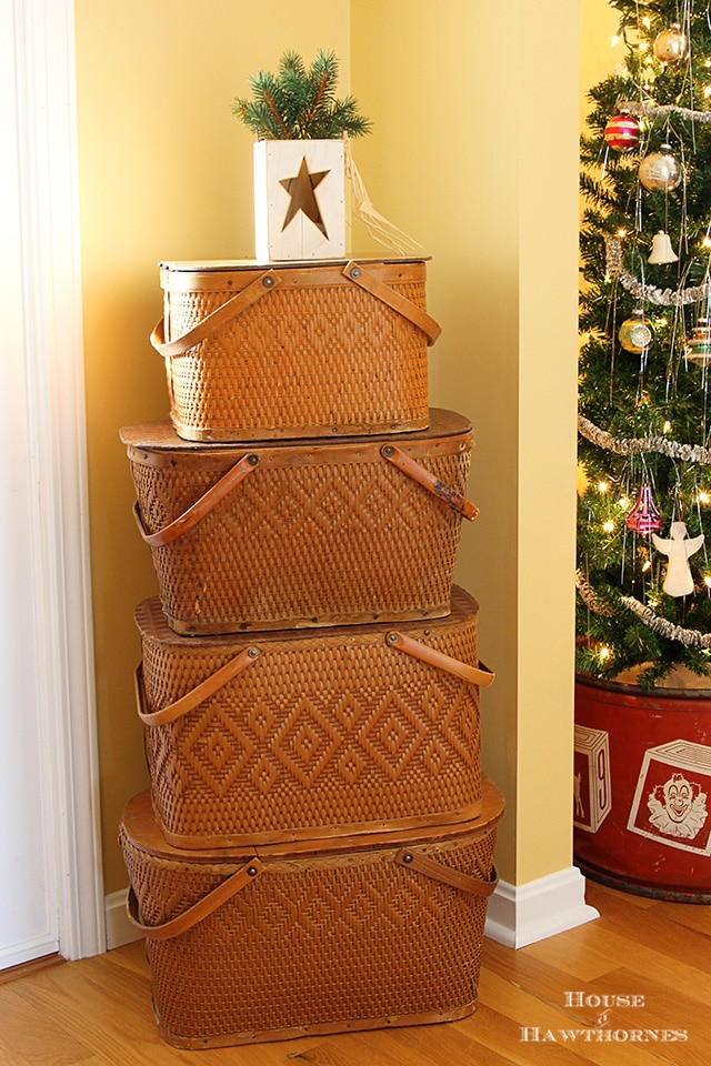 Vintage Redmon picnic baskets stacked to make a fun Christmas tree