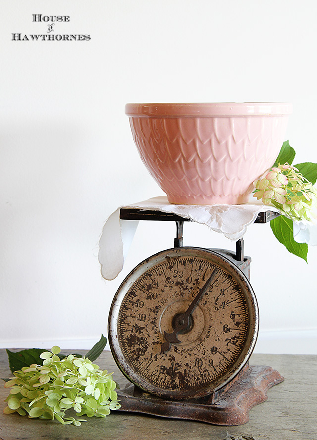 Vintage pink McCoy mixing bowl with fish scale petal feather pattern