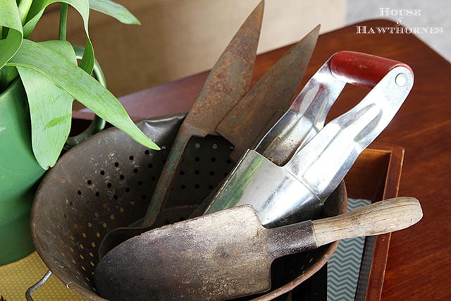 Rusty vintage gardening tools used in a spring vignette Rusty vintage gardening tools used in a spring vignette