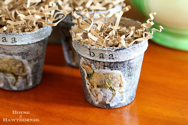 Spring peat pots made with a faux zinc finish and lamb design