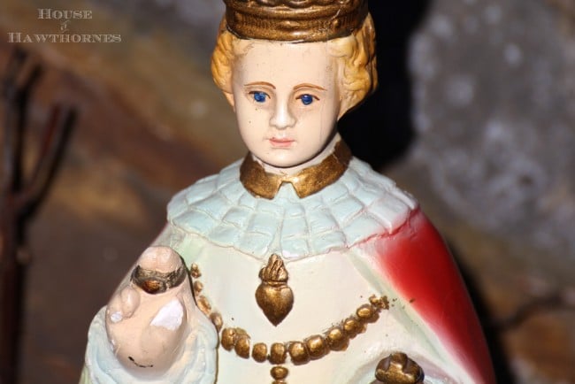 Closeup photo of a Statue of Prague figure found at a thrift store.