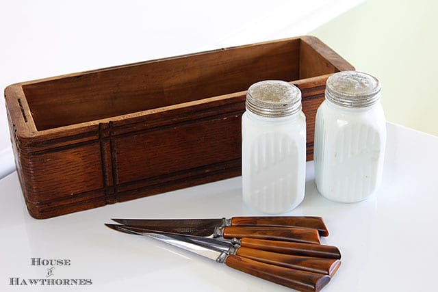 Burns serrated knives and milk glass salt and pepper shakers