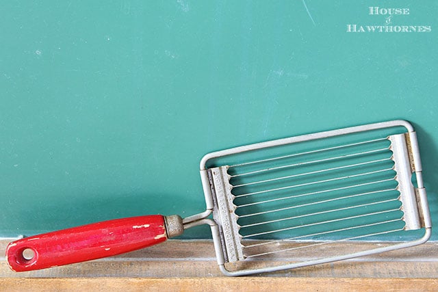 Vintage Ekko tomato slicer repurposed into postcard or photo holder