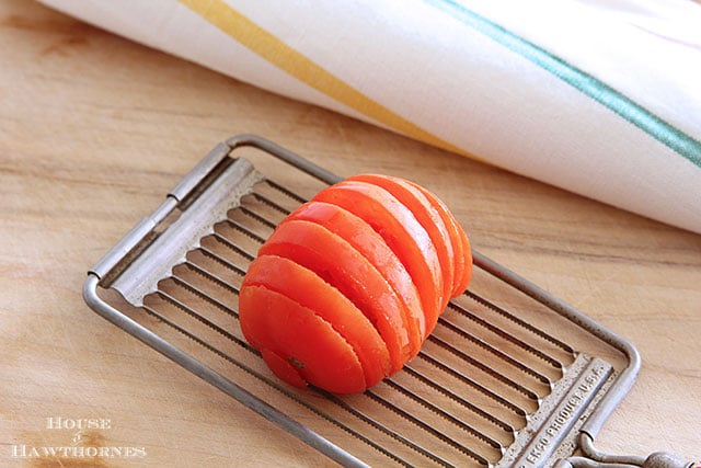 Vintage Ekko tomato slicer repurposed into postcard or photo holder