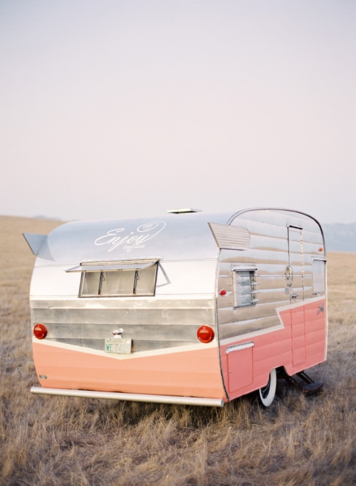 silver and pink vintage Shasta trailer