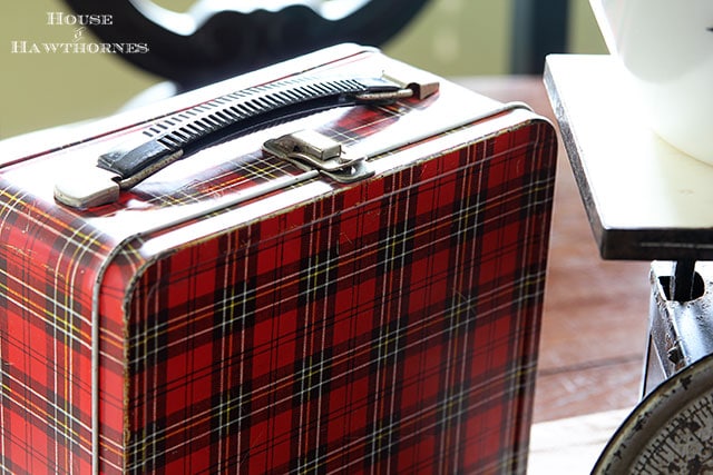 1960's Aladdin plaid lunchbox is part of a fall apple vignette for the kitchen table via houseofhawthornes.com