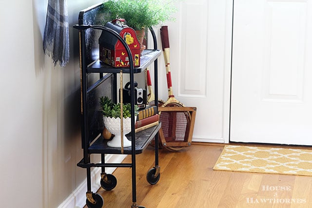 Looking for something different for the hallway? Kick traditional decor to the curb and go for a vintage eclectic look for the entry hallway. via houseofhawthornes.com