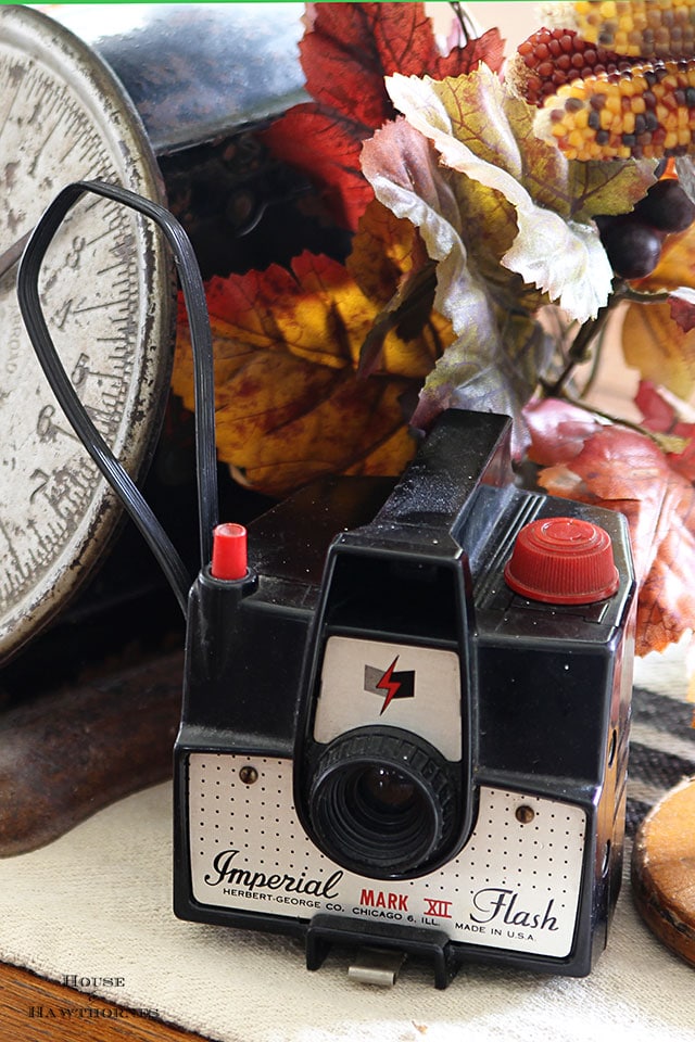 Quick and easy fall table decor. Just add a few key fall elements like acorns, pumpkins or Indian corn to the table and you've got an instant fall look. via houseofhawthornes.com